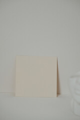Blank white card in boho style interior