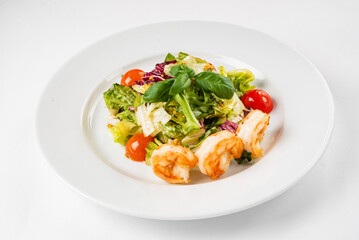 salad with shrimps on the white background