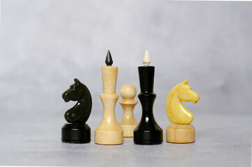 Chess board with black and white chess pieces, selective focus