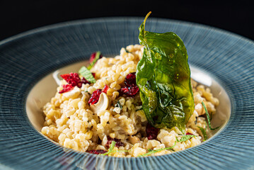 vegan risotto with dried berries and nuts