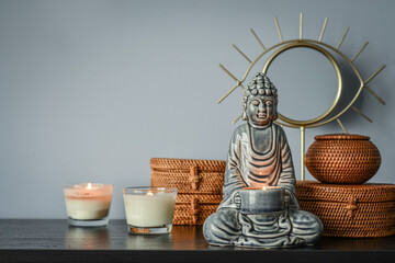 Traditional balinese woven rattan boxes, mirror and buddha