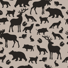 Seamless pattern with silhouettes of forest animals