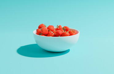 strawberry bowl on blue