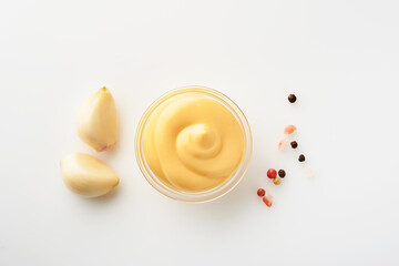 Delicious mayonnaise in glass bowl isolated on white. Mock up. Isolated on white background.