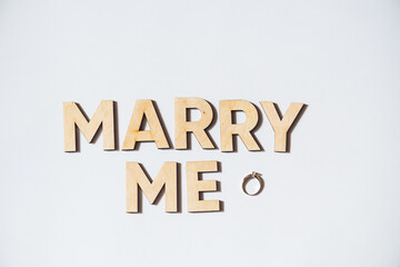 Merry me. Wooden letters