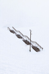 Stairs covered by snow