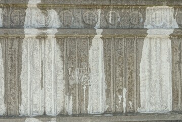 gray white stone background of old wet concrete wall on the street
