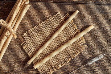 Bamboo straws on a table - zero-waste or sustainable lifestyle concept