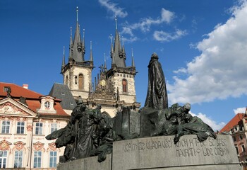 statue of Jan Hus in the background with the Tyn Cathedral on Old Town Square in Prague, Czech Republic