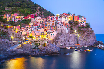 Colorful villages in Cinque terre, Italy and seascape at sunset