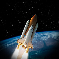 Naklejka premium Rocket in space, earth in distance. The elements of this image furnished by NASA.