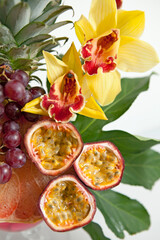 Fototapeta na wymiar Fresh Passion Fruits on a Tropical Fruit Background 