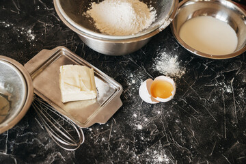 Baking products for making pancakes - Russian traditional cuisine: milk, eggs, flour, butter, на...