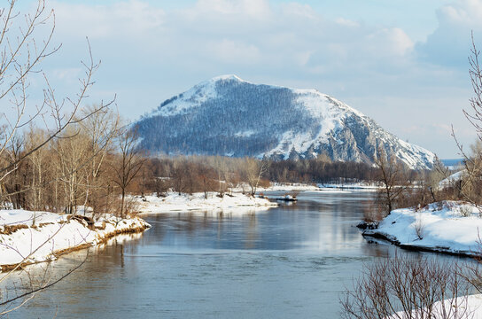 The remain of the reef of the ancient sea, composed of limestone - shikhan Yuraktau in winter. Belaya river.