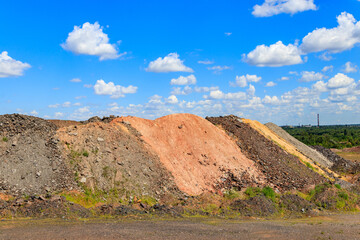 View of slag heaps of iron ore quarry. Mining industry