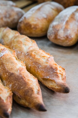 Craft bread on the table at the bakery. The concept of small industries and healthy food