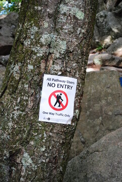 Warning signs along the trail at Purgatory Chasm in MA