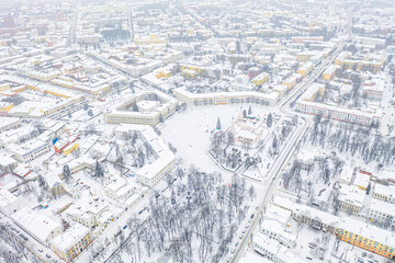 Naklejka na ściany i meble Aerial drone view of Orthodox Church of Elijah the Prophet and old city center in winter of Yaroslavl, Russia. Ancient russian city of the touristic Golden Ring.