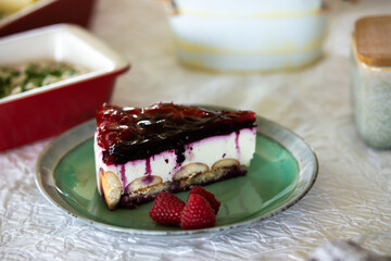 cherry cake with raspberries and sponge cakes