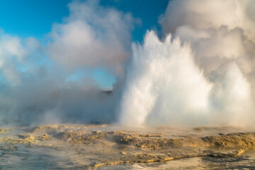 Fototapeta na wymiar A not so faithful geyser at yellowstone erupting