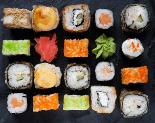 Japanese sushi food. Maki ands rolls with tuna, salmon, shrimp, crab and avocado.