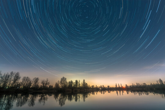 Star trails over the quarry lake Silbersee near Speyer in Germany.