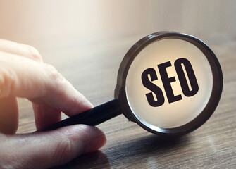 Focused on SEO concept. Businessman is focused to improve SEO and web traffic