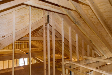 House attic under construction interior inside a frame walls beam built home under construction