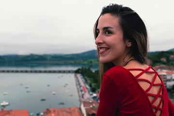 Woman smiling near the port
