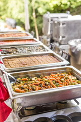 Large Dinner Buffet Outside with Vegetables