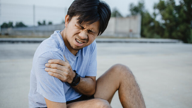 Male Runner With Shoulder Pain