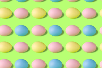 Seamless pattern of Easter multicolored eggs on a green background, Easter Background