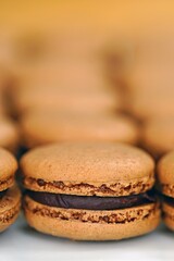 French macaron cookies filled with chocolate ganache cream