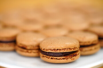 French macaron cookies filled with chocolate ganache cream
