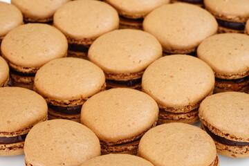 French macaron cookies filled with chocolate ganache cream