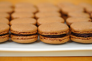 French macaron cookies filled with chocolate ganache cream
