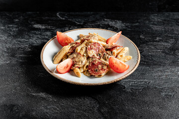 Creamy tomato and salami fettuccine