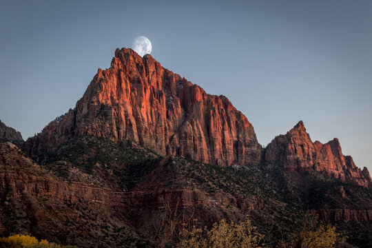 The Watchman Mountain at Sunset With a Moon at Zion National Park Utah - Powered by Adobe