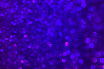 Abstract purple, blue, violet and pink dark neon glitter lights background. Romantic backdrop for Valentines day, womens day, holiday or event