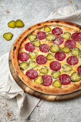 Tasty hot italian pizza with pepperoni and pickles. Pizzeria menu. Concept poster for Restaurants or pizzerias. 