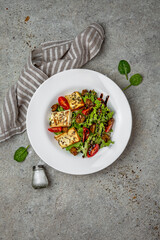 Fresh vegetable salad: tomatoes, cucumbers, olives, chicken. Healthy balanced dietary nutritious food.