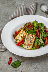 Fresh vegetable salad: tomatoes, cucumbers, olives, chicken. Healthy balanced dietary nutritious food.
