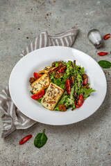 Fresh vegetable salad: tomatoes, cucumbers, olives, chicken. Healthy balanced dietary nutritious food.