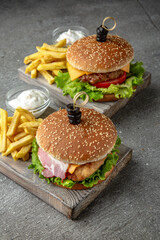 Delicious juicy burgers from Brioche Bun, fresh vegetables, delicious. Hamburger for poster or menu. Free space for text.