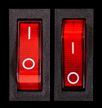 Red power switches at ON and OF position, isolated on black background