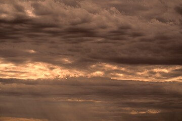 This image shows a cloudy sky at sunset.