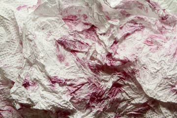 Grape stain on tissue paper