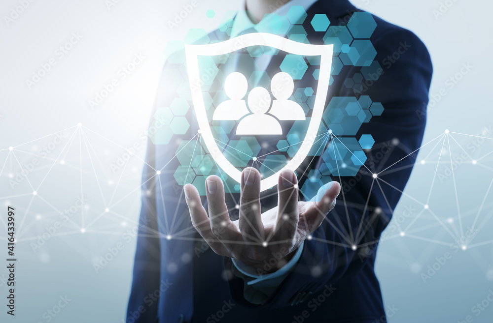 Poster protection of personal information. concept image of network security. businessperson holding shield