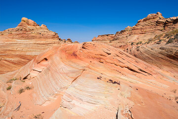The beautiful landscape and rock formations of Coyote Buttes South in the Vermilion Cliffs National...