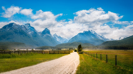 The scenic but very remote unsealed Glenorchy-Paradise road - view towards the mountain range at Mount Aspiring National Park, New Zealand, South Island.